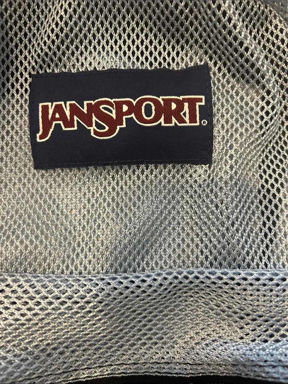Jansport Light Blue Mesh Backpack with Front Zip Pocket